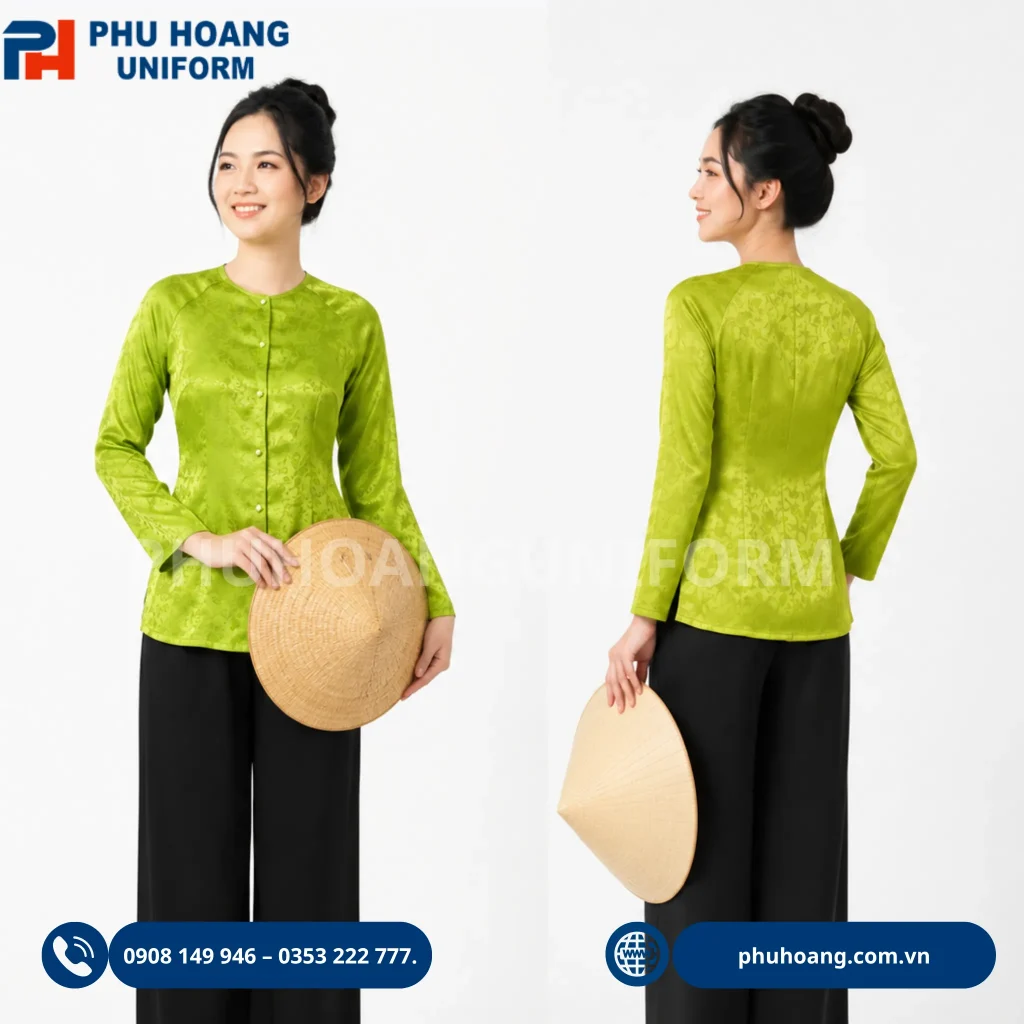 Mẫu áo bà ba đồng phục xanh lá cốm phối quần đen Hình ảnh mẫu nữ Việt Nam mặc áo bà ba đồng phục màu xanh lá cốm, phối quần đen, tạo dáng thanh lịch cùng nón lá trên nền trắng. Thiết kế áo bà ba mang phong cách truyền thống, dịu dàng và hiện đại.