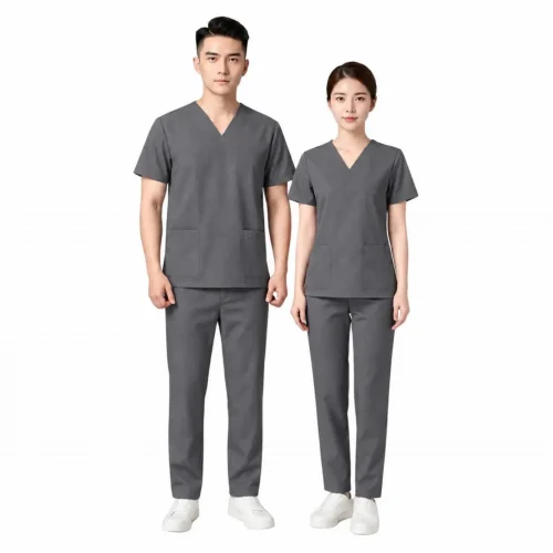 Đồng phục scrubs ghi cao cấp cho spa và clinic, chất liệu vải cotton lạnh, áo cổ tim và quần lưng cạp chun tiện dụng của Phú Hoàng Uniform.