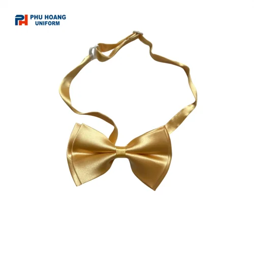 Nơ phục vụ màu vàng may sẵn nổi bật với thiết kế gọn gàng, dễ đeo và phù hợp phối cùng áo sơ mi đồng phục. Sản phẩm thích hợp cho nhân viên nhà hàng, khách sạn, tiệc cưới, sự kiện và dịch vụ ăn uống.