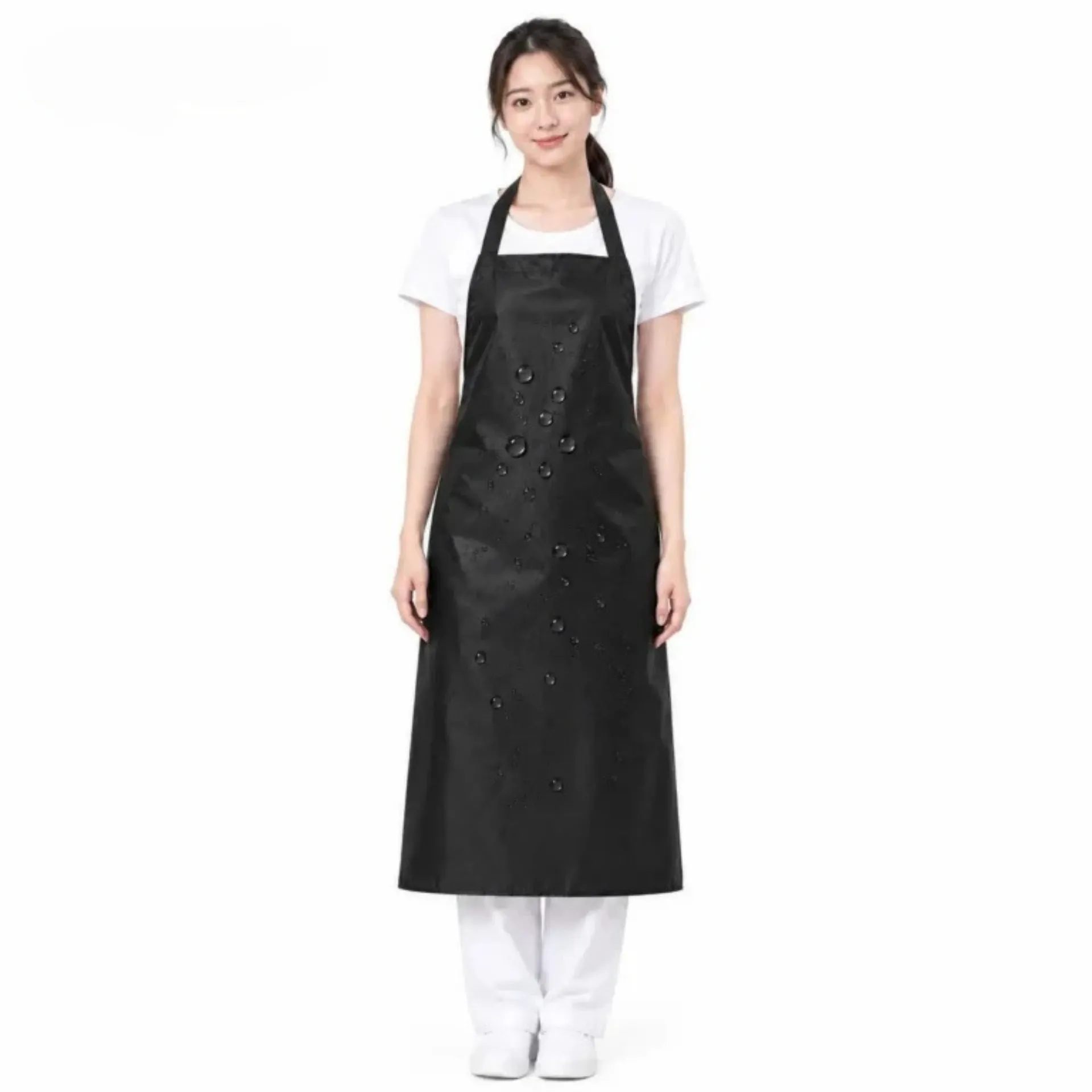 tap-de-nilon-mau-den(7) Hình ảnh nam và nữ mặc mẫu tạp dề nilon màu đen cao cấp, kích thước 100x75cm, chống thấm nước tuyệt đối, phù hợp cho nhà bếp, salon tóc và công nghiệp.