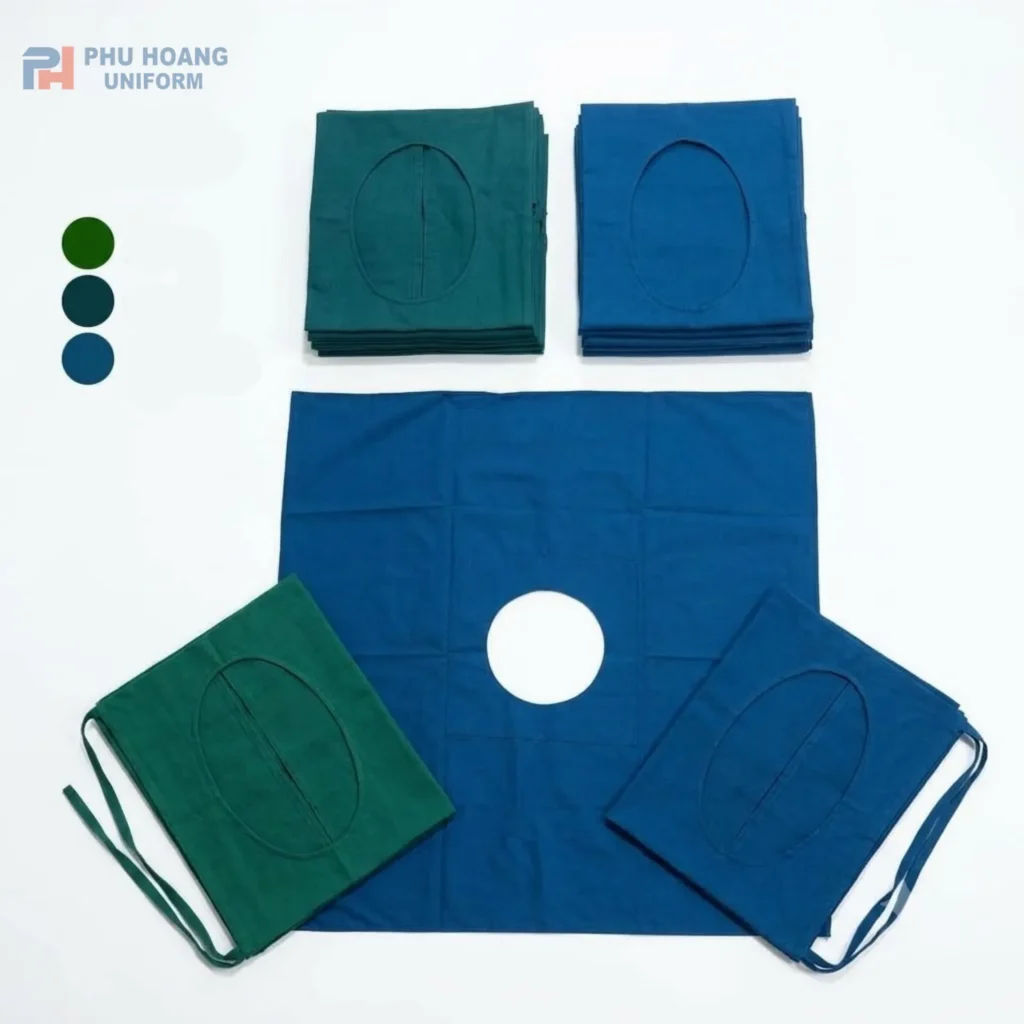 Săng phẫu thuật khuyết chuẩn y khoa do Phú Hoàng sản xuất Hình ảnh bộ săng phẫu thuật khuyết (săng có lỗ) y tế cao cấp với các tông màu xanh chuyên dụng từ Đồng Phục Phú Hoàng