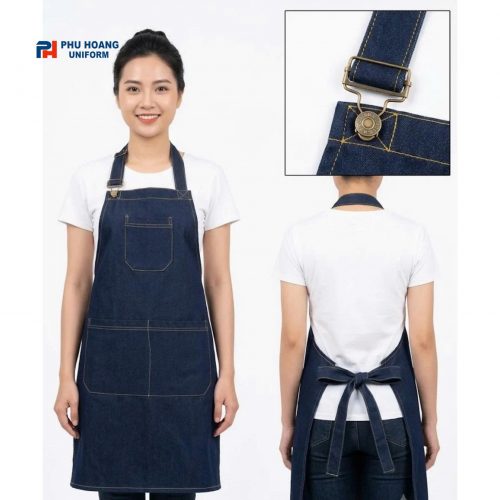 Tạp dề yếm jeans denim xanh navy có tăng đơ điều chỉnh dây và khóa đồng, 2 túi, chỉ nổi vàng – Phú Hoàng Uniform